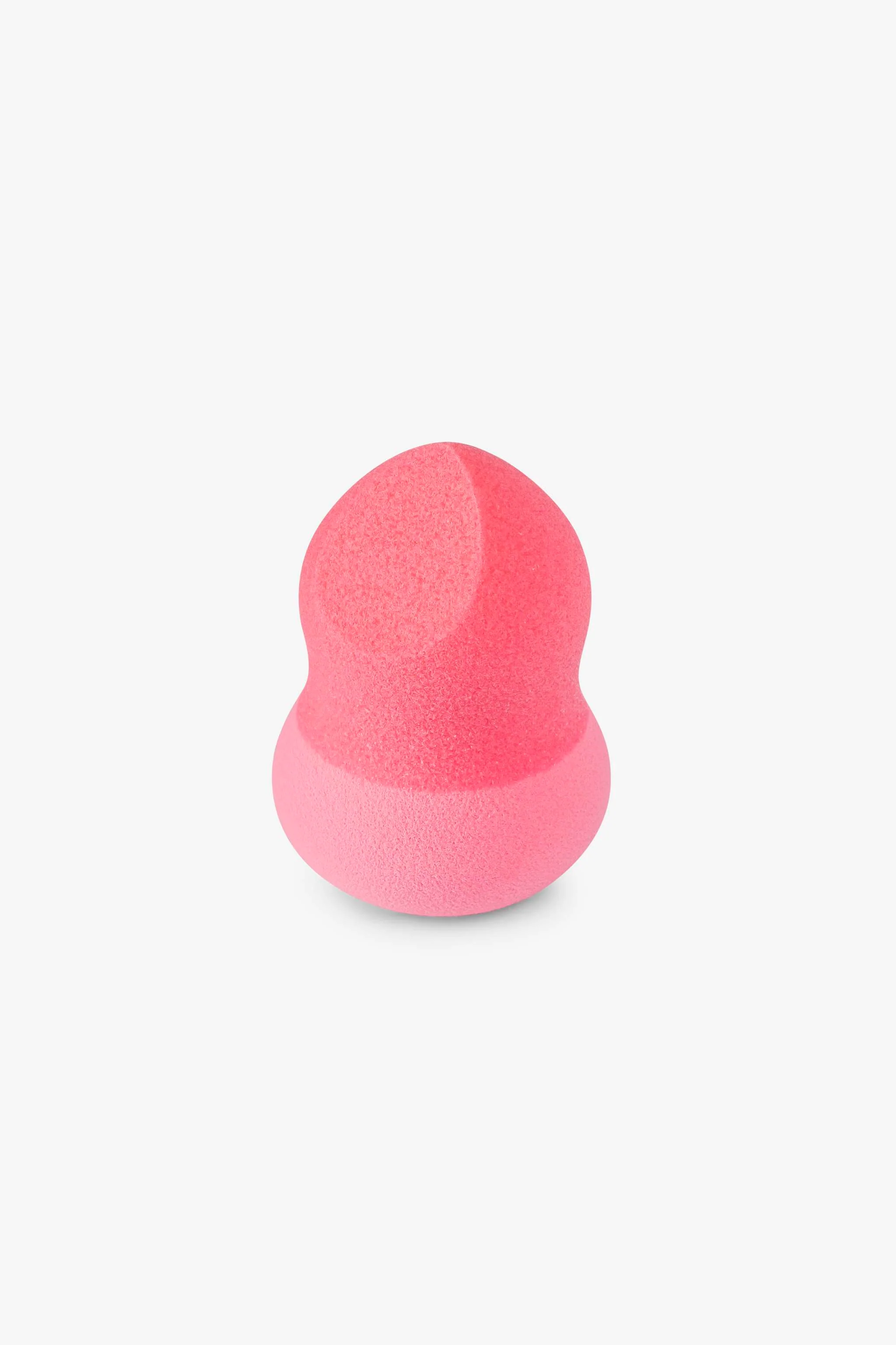 Esponja para maquillaje rosada, textura suave y forma ovalada