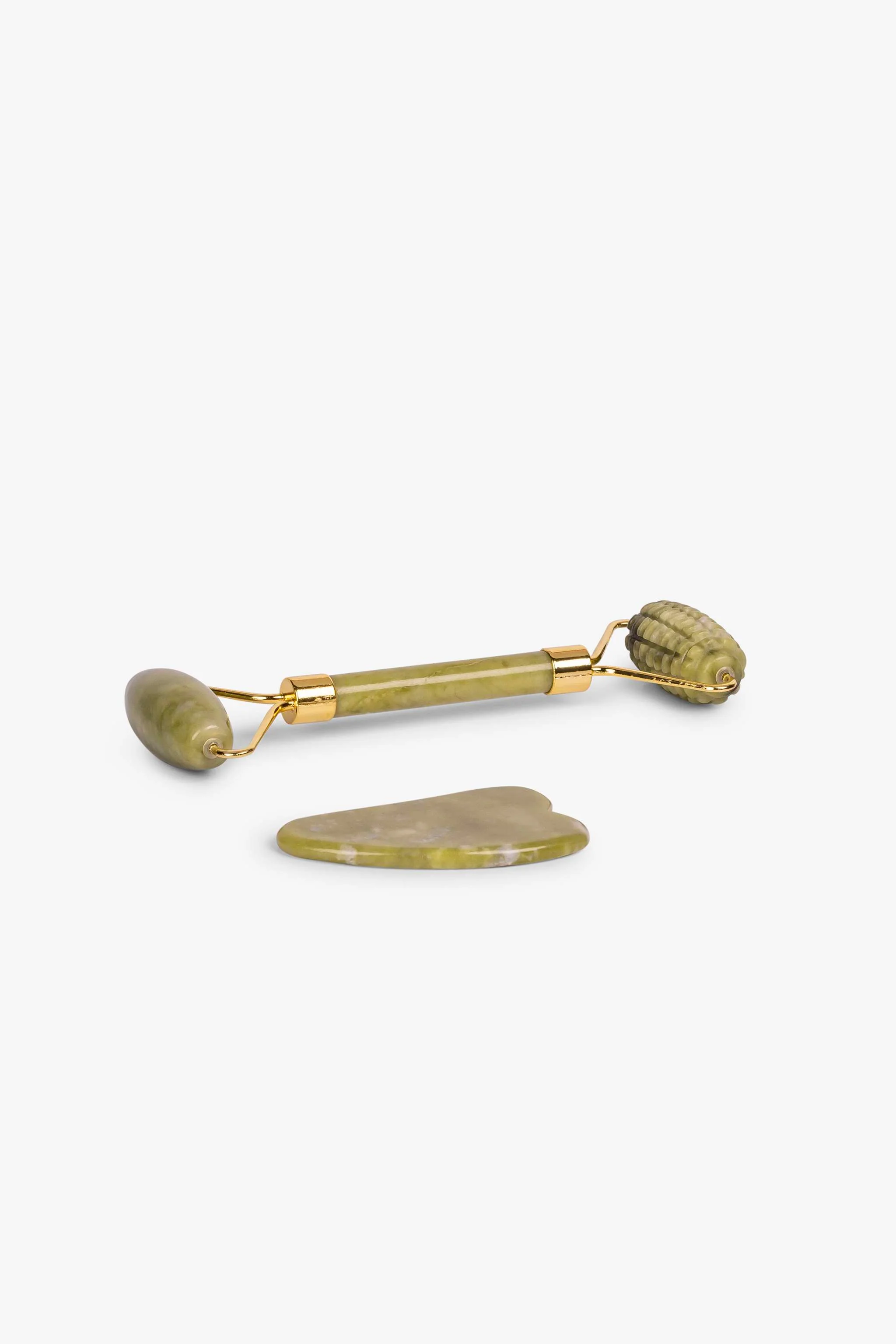 Rodillo y piedra de jade, masaje facial y efecto relajante
